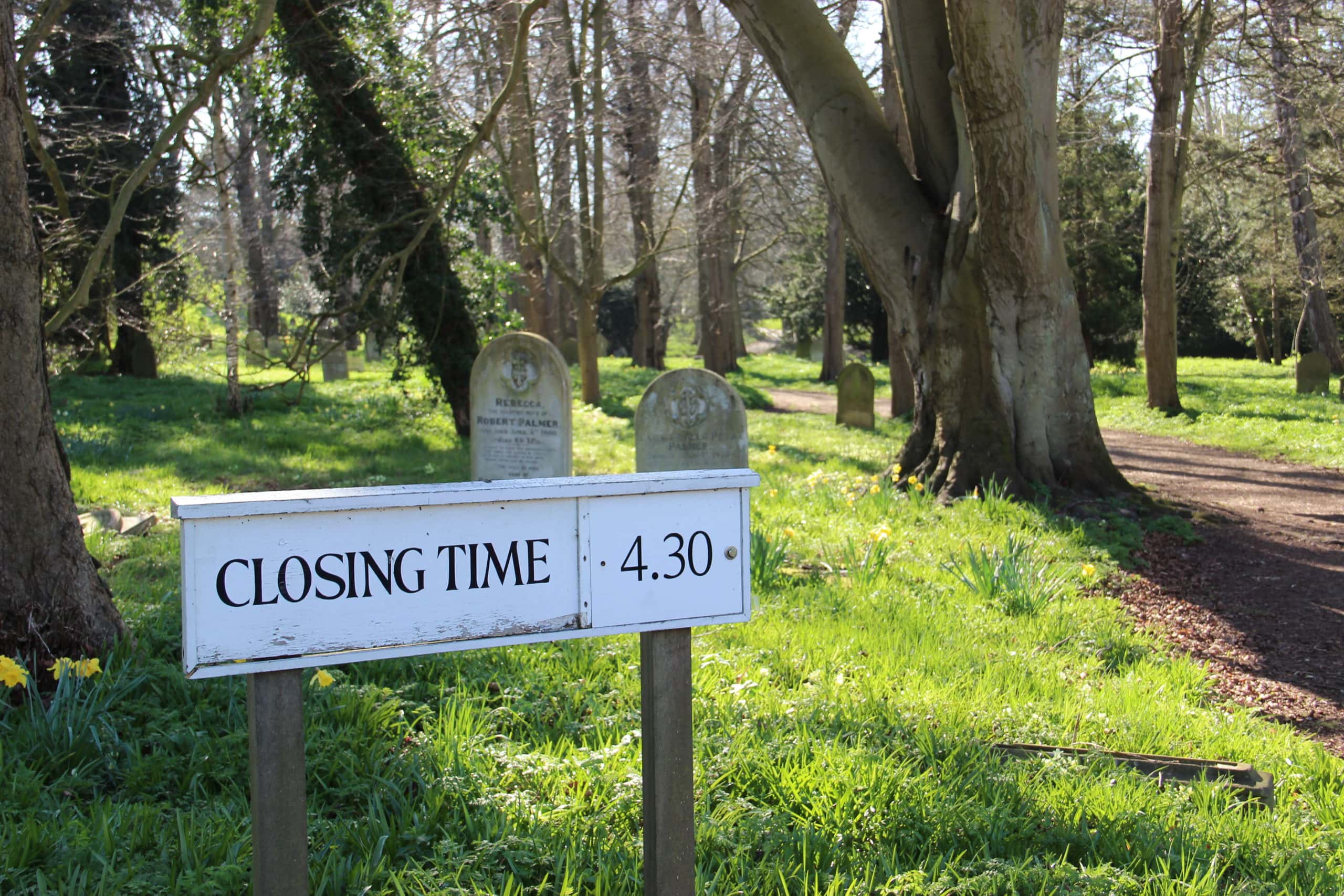 A sign in a cemetery